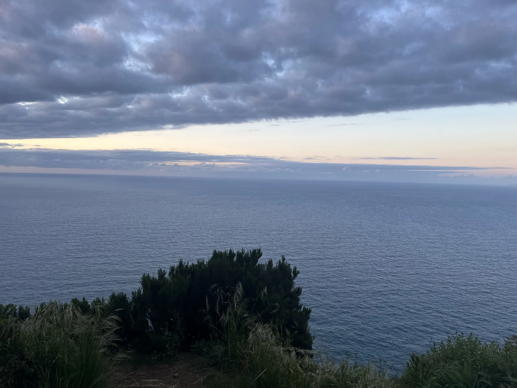 The evening sky and a strip of sunset light above the Atlantic in Madeira