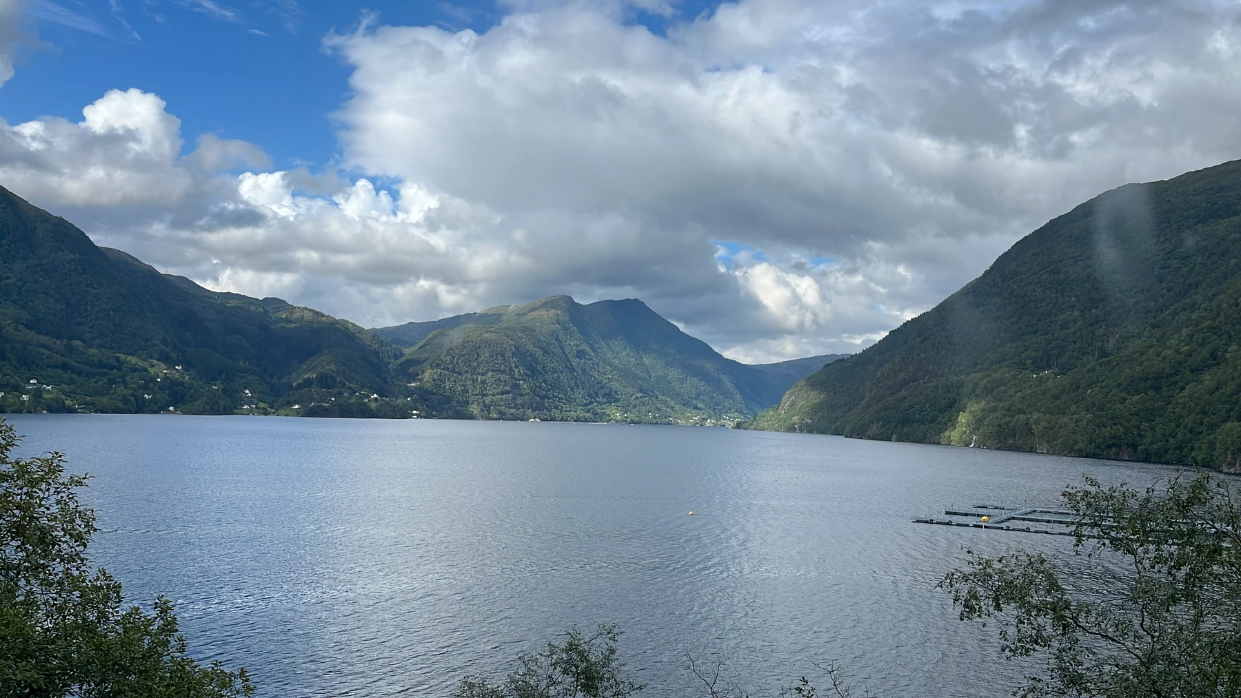 Blue water between steep green mountains on my Norway trip